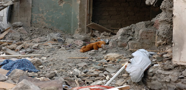 us_navy_080825-n-0629h-010_a_teddy_bear_lies_amidst_rubble_in_gori_after_the_recent_conflict_between_georgia_and_russia